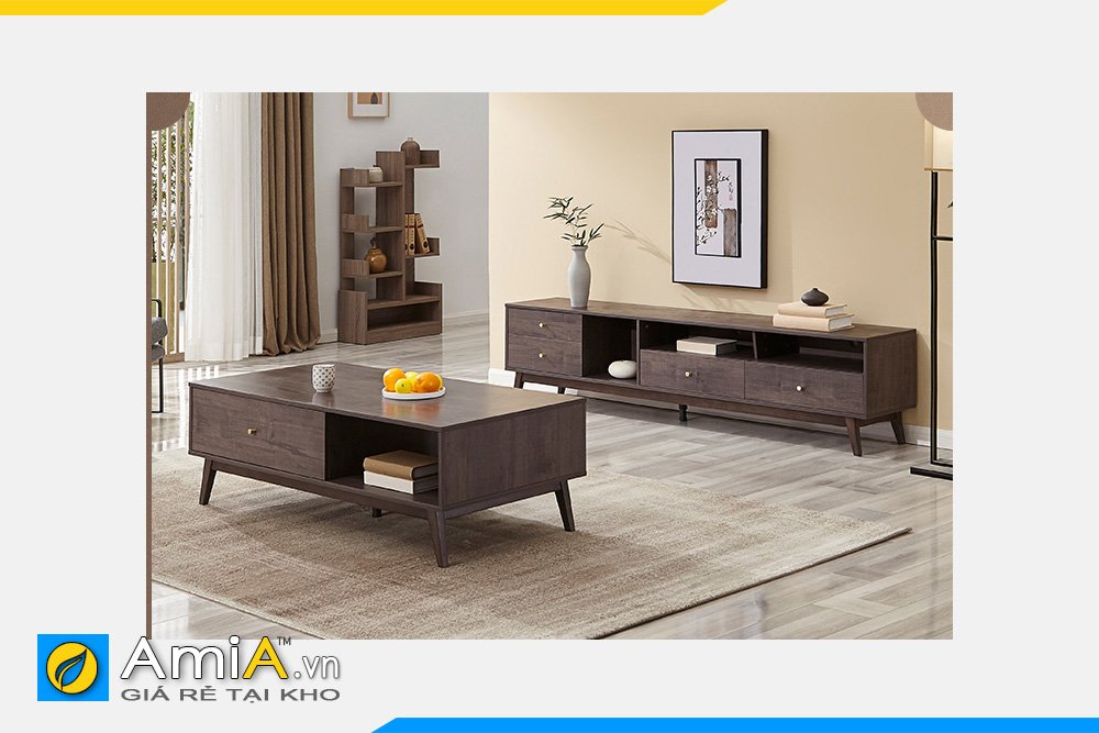 Một chiếc bàn trà tủ kệ gỗ với thiết kế đa năng giúp bạn tiết kiệm không gian cho phòng khách của bạn. Những chiếc tủ kệ được sắp xếp khoa học có thể chứa đựng được nhiều đồ vật và sẽ giúp cho căn phòng nhà bạn trở nên gọn gàng hơn. Hãy cùng xem ảnh và lựa chọn cho mình một chiếc bàn trà tủ kệ gỗ hiện đại.